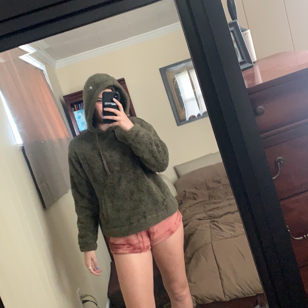 green fluffy sweatshirt